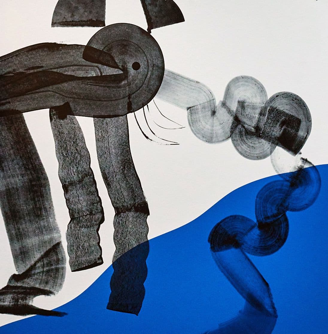 Illustration i svart, vitt och blått av en elefant.