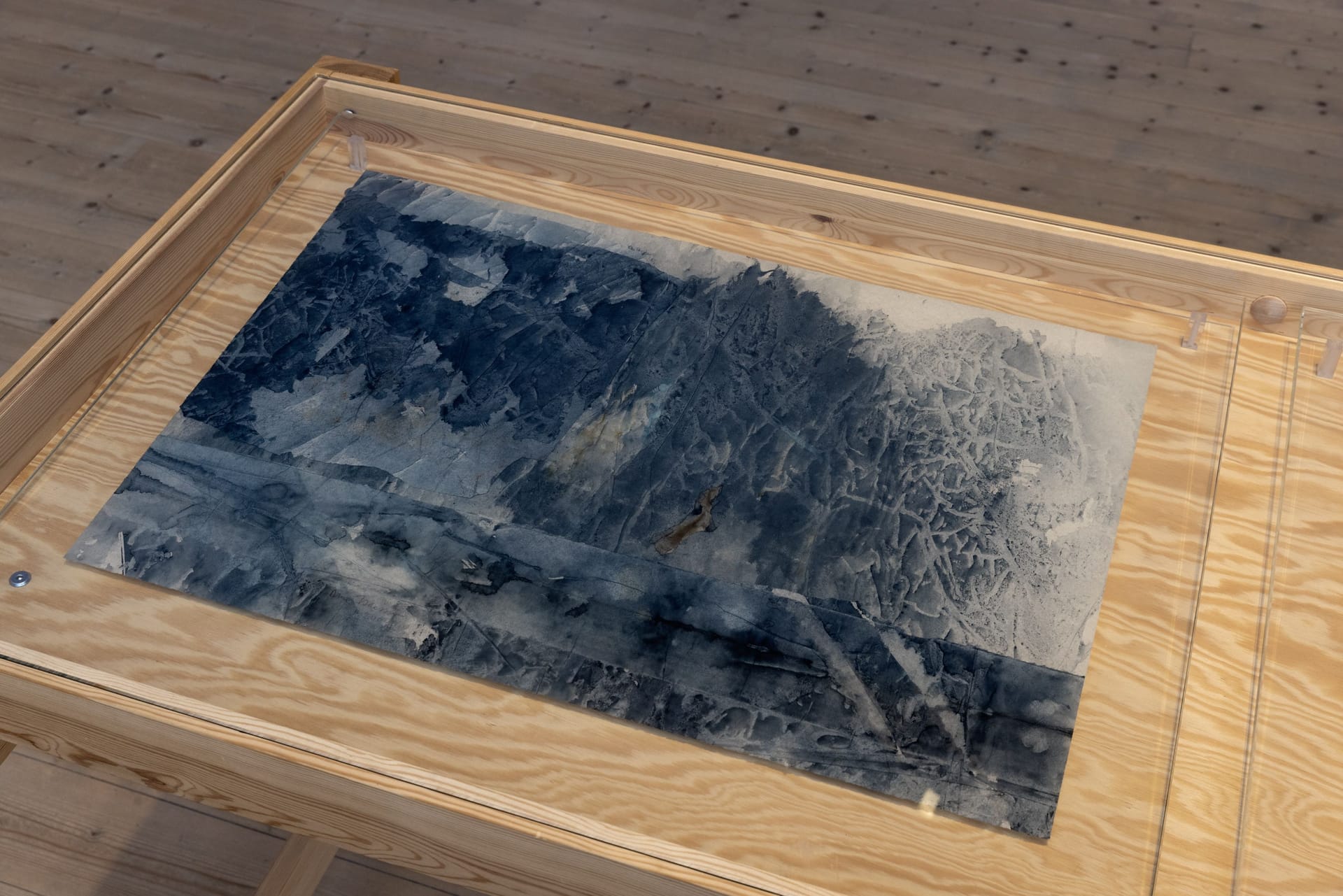 Work by Arne Isacsson in wooden board with painted glass