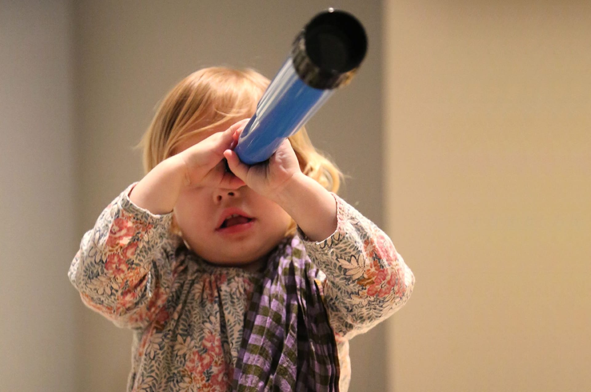 Kid with blue binoculars