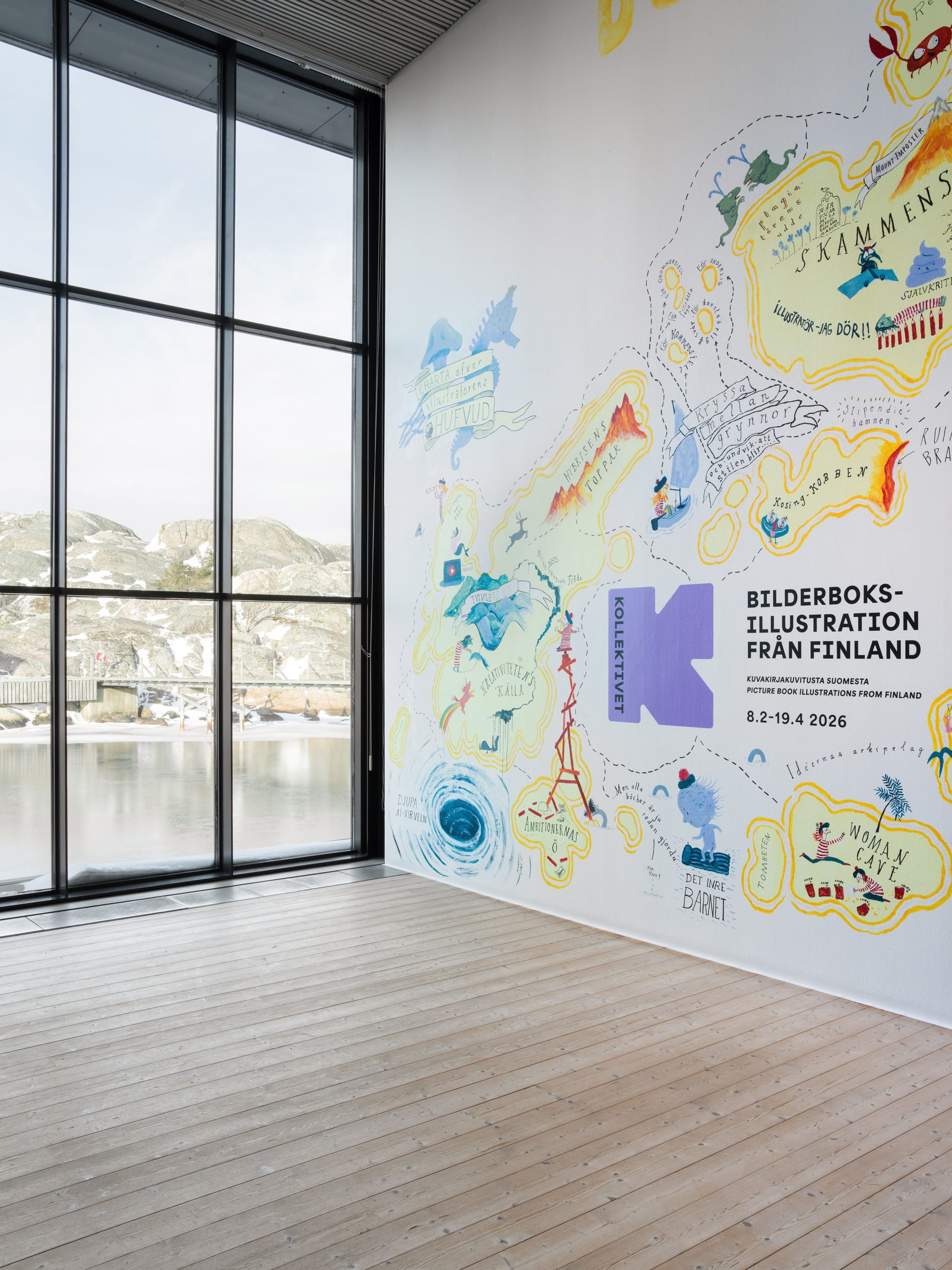 Bright mural and windows looking out over the cliffs