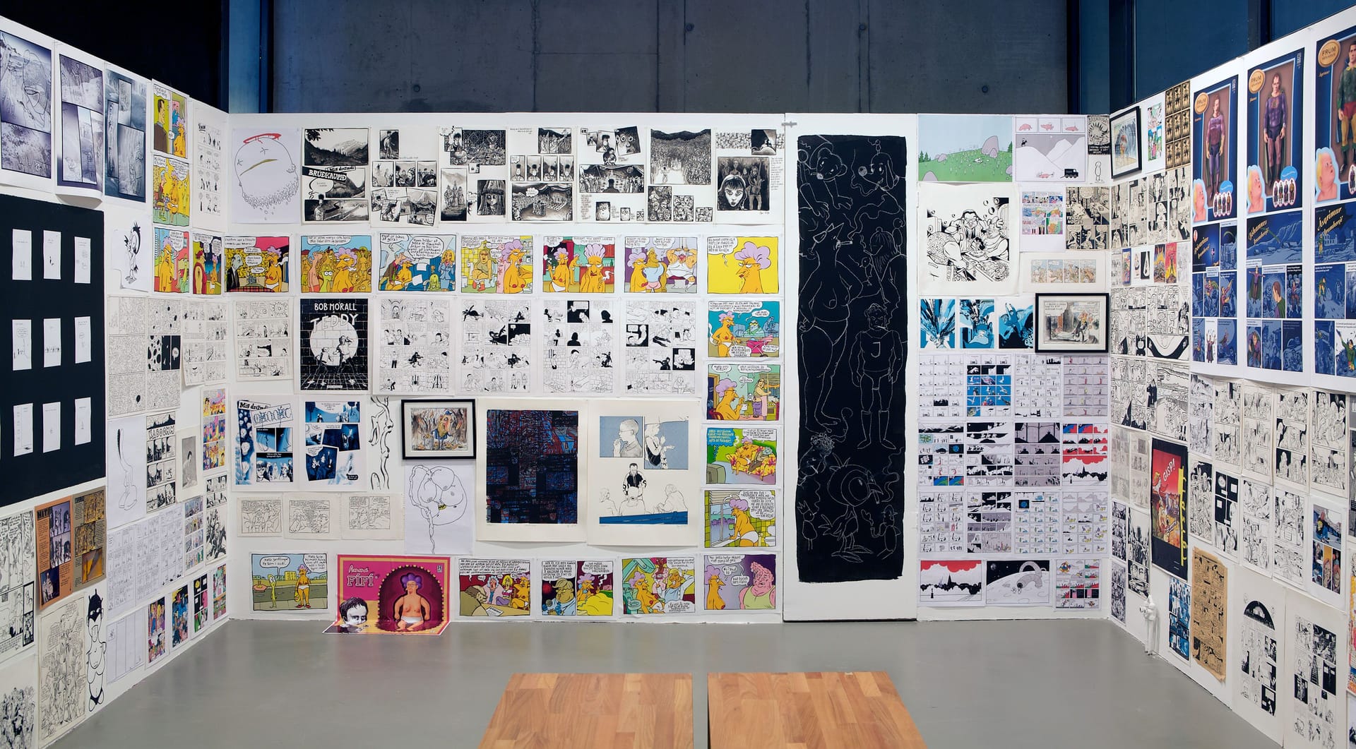 Room with cartoons covering the walls