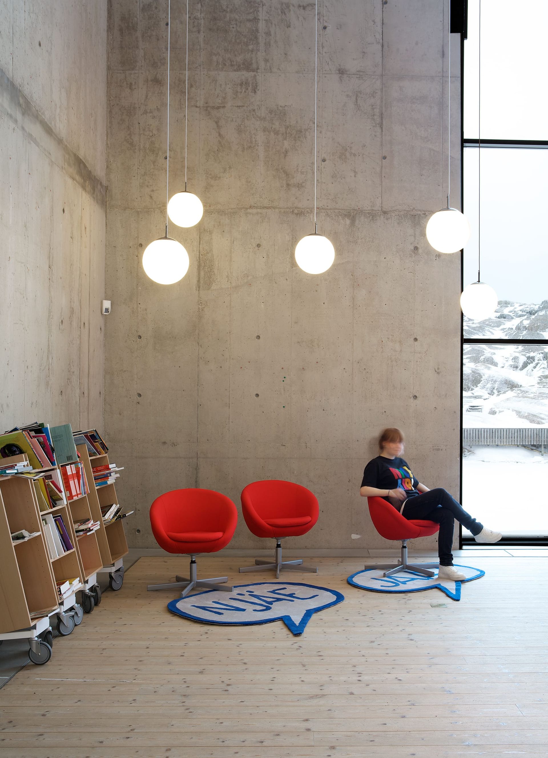 Red chairs in exhibition room