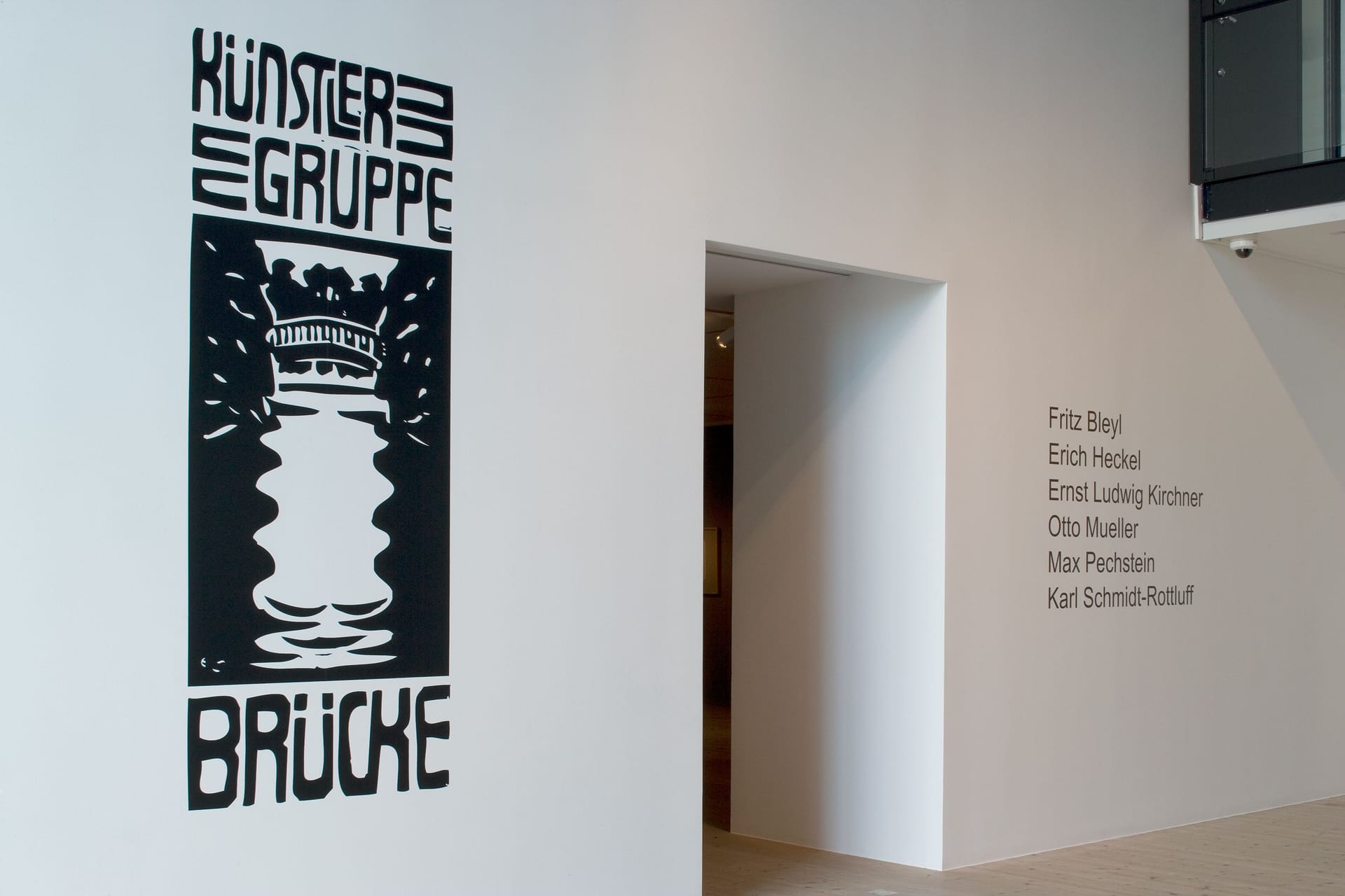 Exhibition with title on the wall