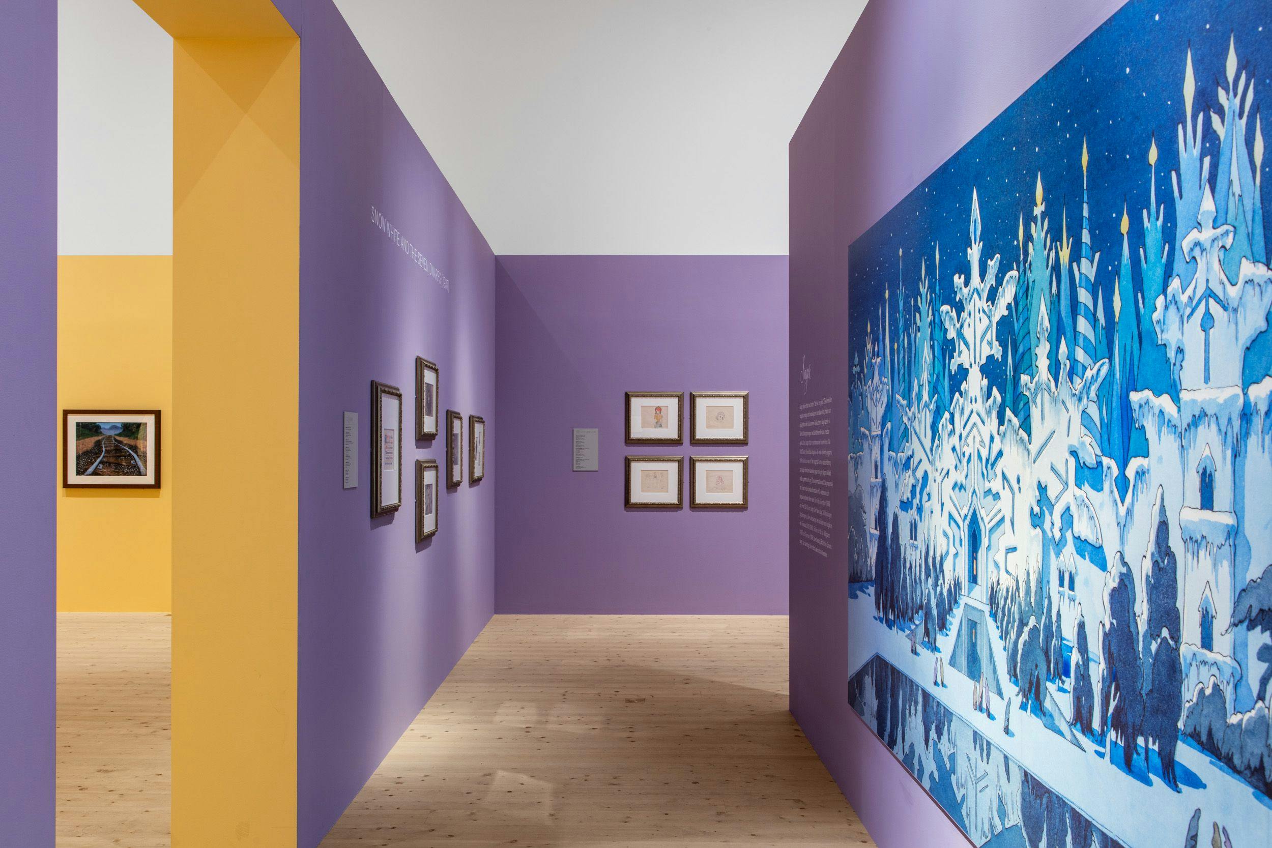 Yellow and purple walls, in the foreground large reproduction of concept sketch from Frozen