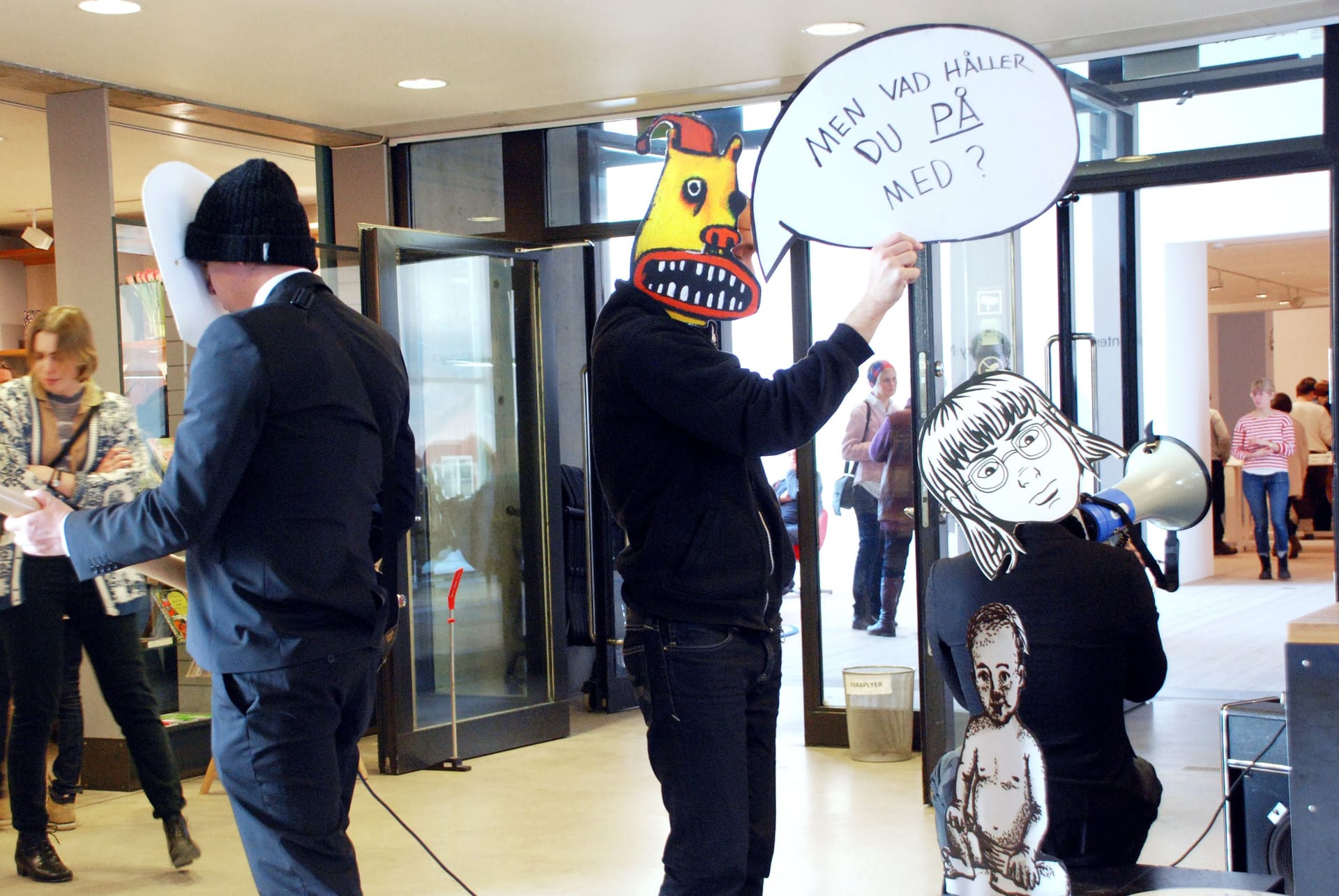 People wearing cartoon masks